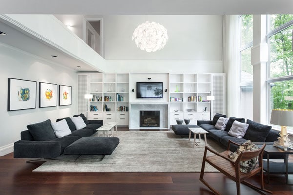 interior-black-sofa-with-small-white-cushions